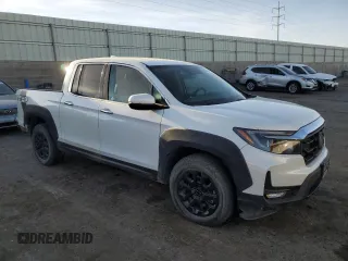 2022 Honda Ridgeline RTL-E with VIN 5FPYK3F77NB031233, listed as a Copart auction lot 49735525 with 71,450 mi miles and Salvage Title. Bid and sale history available at DreamBid. Image 4.