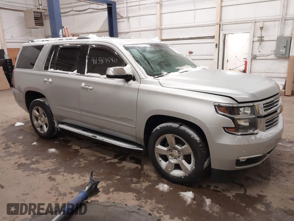 2016 Chevrolet Tahoe LTZ z VIN 1GNSKCKCXGR284827, wystawiony jako IAAI lot #41389540 z przebiegiem 93 150 mil mil oraz . Historia ofert i sprzedaży dostępna na DreamBid. Obrazek 13.