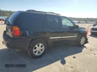 2006 GMC Envoy SLT with VIN 1GKDT13S462359008, listed as a Copart auction lot 80014324 with 158,906 mi miles and Salvage Title. Bid and sale history available at carsss.com. Image 3.