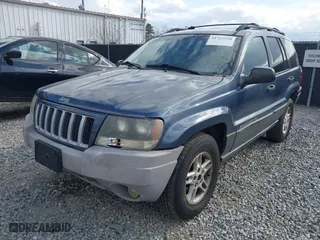 2004 Jeep Grand Cherokee Laredo with VIN 1J4GX48S14C324581, listed as a IAAI auction lot 41717938 with 213,178 mi miles. Bid and sale history available at carsss.com. Image 2.