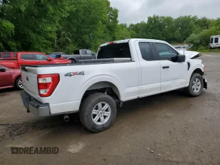 2021 Ford F-150 XL with VIN 1FTFX1E51MFC05216, listed as a Copart auction lot 56571785 with 94,584 mi miles and Salvage title. Bid and sale history available at DreamBid. Image 3.