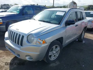 2008 Jeep Compass Sport with VIN 1J8FT47W18D728894, listed as a IAAI auction lot 41925519 with 154,124 mi miles. Bid and sale history available at carsss.com. Image 2.