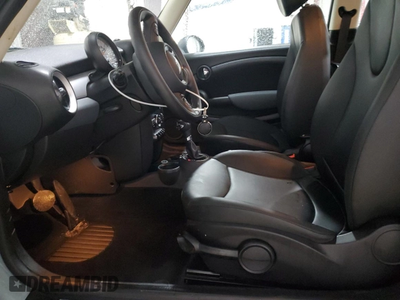 2012 MINI Hardtop with VIN WMWSU3C55CT541969, listed as a Copart auction lot 60988325 with 44,770 mi miles and Salvage title. Bid and sale history available at DreamBid. Image 7.