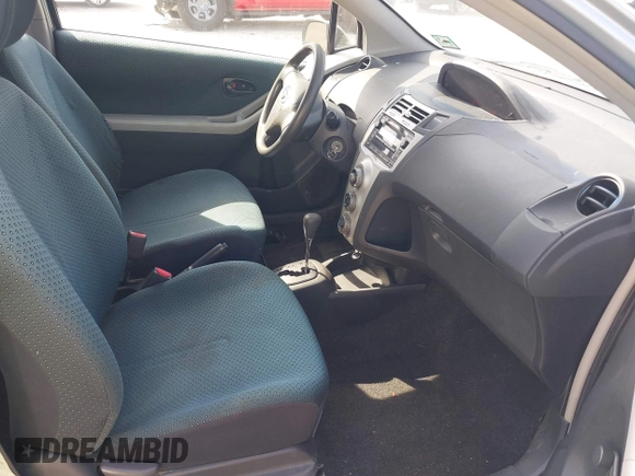 2008 Toyota Yaris with VIN JTDJT923185180160, listed as a IAAI auction lot 42169896 with 340,931 mi miles. Bid and sale history available at carsss.com. Image 5.