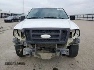 2007 Ford F-150 XL with VIN 1FTPX12557NA26440, listed as a Copart auction lot 41621445 with 184,854 mi miles and Salvage Title. Bid and sale history available at carsss.com. Image 5.