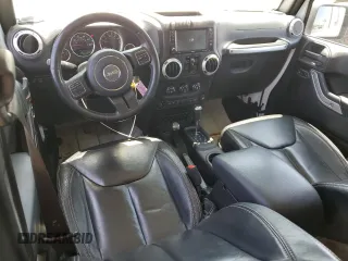2015 Jeep Wrangler Unlimited Rubicon with VIN 1C4BJWFG6FL508493, listed as a Copart auction lot 54788635 with 127,694 mi miles and Salvage title. Bid and sale history available at DreamBid. Image 8.