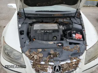 2005 Acura RL z VIN JH4KB16515C020791, wystawiony jako Copart lot #59802735 z przebiegiem Nie podano mil oraz Szkoda całkowita • Salvage title. Historia ofert i sprzedaży dostępna na DreamBid. Obrazek 11.