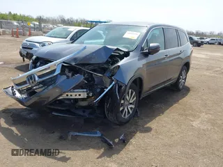 2019 Honda Pilot EX-L with VIN 5FNYF6H55KB082929, listed as a IAAI auction lot 42057611 with 93,532 mi miles and . Bid and sale history available at DreamBid. Image 17.