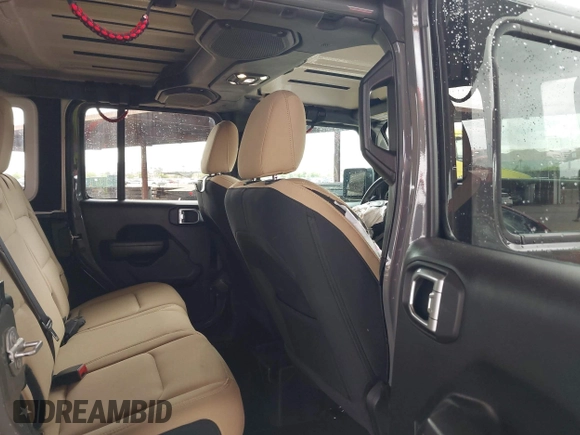 2020 Jeep Wrangler Unlimited Black and Tan с VIN 1C4HJXDG3LW266615, выставлен на аукционе IAAI как лот 42207899 с пробегом 55 291 миль миль и . История ставок и продаж доступна на DreamBid. Изображение 8.