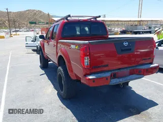 2015 Nissan Frontier SL with VIN 1N6AD0EV1FN711521, listed as a IAAI auction lot 42525352 with 203,114 mi miles and . Bid and sale history available at DreamBid. Image 3.