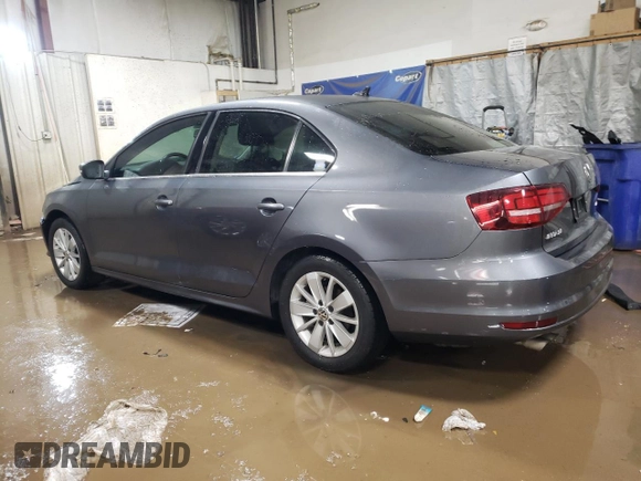 2016 Volkswagen Jetta Sedan 1.4T SE with VIN 3VWD67AJ7GM389000, listed as a Copart auction lot 44907835 with 124,697 mi miles and Salvage Title. Bid and sale history available at carsss.com. Image 2.
