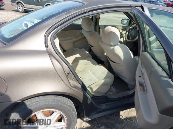 2002 Oldsmobile Alero GL1 z VIN 1G3NL52E82C172314, wystawiony jako IAAI lot #41465789 z przebiegiem 118 427 mil mil oraz . Historia ofert i sprzedaży dostępna na DreamBid. Obrazek 8.