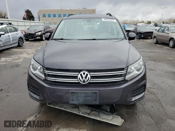 2016 Volkswagen Tiguan SE with VIN WVGBV7AX9GW558477, listed as a Copart auction lot 49063695 with 134,651 mi miles and Salvage Title. Bid and sale history available at DreamBid. Image 5.