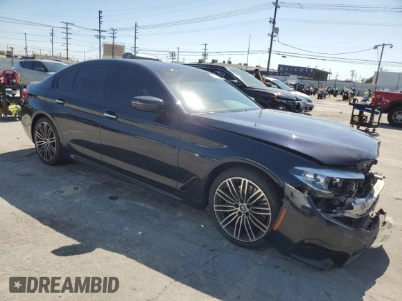 2018 BMW 5 Series 530i with VIN WBAJA5C59JWA35964, listed as a Copart auction lot 49891975 with 111,809 mi miles and Salvage Title. Bid and sale history available at DreamBid. Image 4.