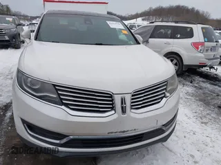 2016 Lincoln MKX Select with VIN 2LMTJ8KR3GBL31765, listed as a IAAI auction lot 41352530 with 155,376 mi miles. Bid and sale history available at carsss.com. Image 12.