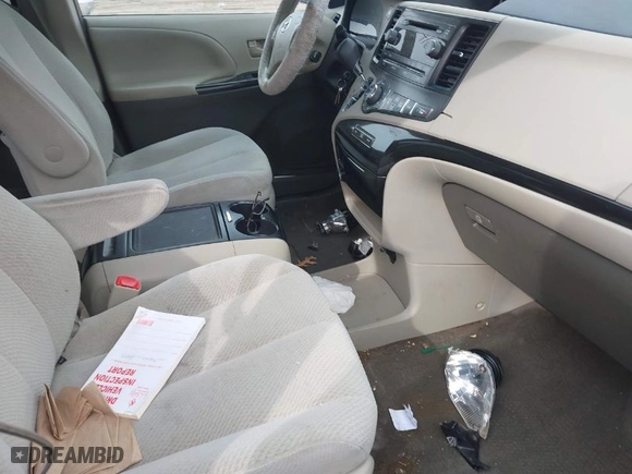 2014 Toyota Sienna LE AAS with VIN 5TDKK3DC6ES433383, listed as a IAAI auction lot 41607527 with 115,235 mi miles. Bid and sale history available at carsss.com. Image 5.