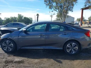 2017 Honda Civic EX-T with VIN 2HGFC1F33HH650782, listed as a IAAI auction lot 41685090 with 113,319 mi miles and . Bid and sale history available at carsss.com. Image 15.