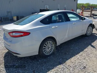2013 Ford Fusion SE Hybrid z VIN 3FA6P0LU9DR349321, wystawiony jako IAAI lot #42156321 z przebiegiem 90 688 mil mil oraz . Historia ofert i sprzedaży dostępna na DreamBid. Obrazek 4.