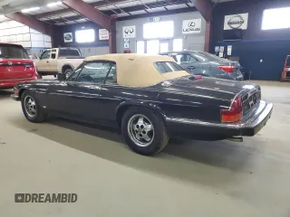 1988 Jaguar XJS z VIN SAJNV5843JC147927, wystawiony jako Copart lot #58988575 z przebiegiem 81 239 mil mil oraz Tytuł czysty. Historia ofert i sprzedaży dostępna na DreamBid. Obrazek 2.