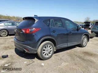 2014 Mazda CX-5 Touring with VIN JM3KE4CY4E0407868, listed as a Copart auction lot 52564315 with 137,989 mi miles and Salvage Title. Bid and sale history available at carsss.com. Image 3.
