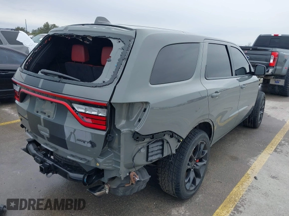 2021 Dodge Durango SRT Hellcat with VIN 1C4SDJH92MC605759, listed as a IAAI auction lot 41639174 with 4,800 mi miles and . Bid and sale history available at DreamBid. Image 4.