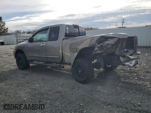 2006 Nissan Titan SE with VIN 1N6BA06B36N575815, listed as a Copart auction lot 79679104 with Not Provided miles and Salvage Title. Bid and sale history available at DreamBid. Image 2.