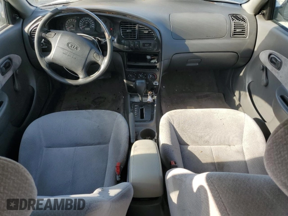 2004 Kia Spectra z VIN KNAFB121145308252, wystawiony jako Copart lot #53377555 z przebiegiem 206 439 mil mil oraz Szkoda całkowita • Salvage title. Historia ofert i sprzedaży dostępna na DreamBid. Obrazek 8.