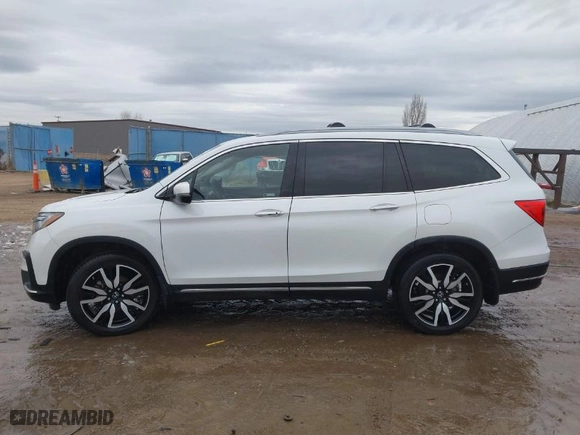2021 Honda Pilot Elite with VIN 5FNYF6H03MB044154, listed as a IAAI auction lot 41050202 with 60,331 mi miles. Bid and sale history available at carsss.com. Image 14.