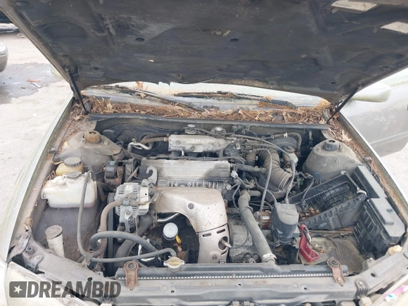2001 Toyota Camry CE with VIN 4T1BG28K11U040227, listed as a IAAI auction lot 42220307 with 212,125 mi miles and . Bid and sale history available at DreamBid. Image 10.