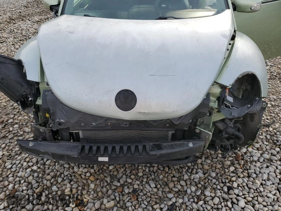 2010 Volkswagen New Beetle Coupe with VIN 3VWPW3AG5AM010674, listed as a Copart auction lot 51767595 with 134,418 mi miles and Salvage Title. Bid and sale history available at carsss.com. Image 11.