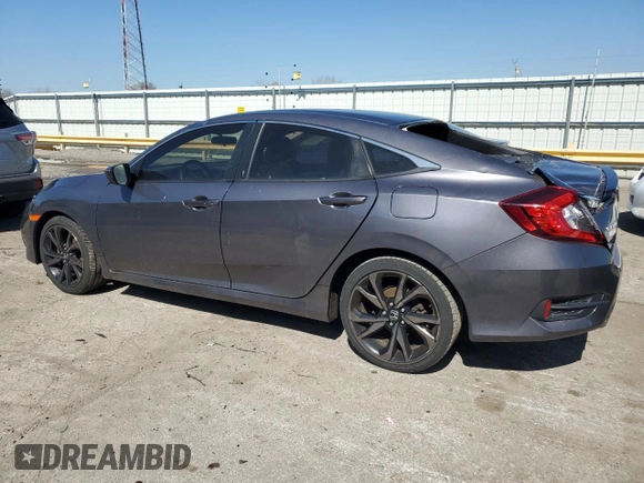 2019 Honda Civic Sport with VIN 2HGFC2F80KH565567, listed as a Copart auction lot 52384625 with 89,947 mi miles and Salvage title. Bid and sale history available at DreamBid. Image 2.