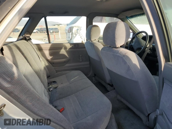 1994 Ford Escort z VIN 3FARP15J2RR121478, wystawiony jako Copart lot #42026955 z przebiegiem 541 834 mil mil oraz Czysty tytuł • Clean title. Historia ofert i sprzedaży dostępna na DreamBid. Obrazek 10.