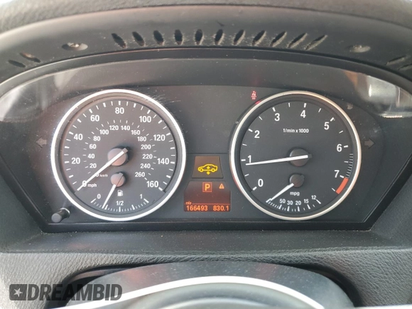 2013 BMW X5 xDrive35i z VIN 5UXZV4C5XD0B03182, wystawiony jako Copart lot #54906305 z przebiegiem 166 493 mil mil oraz Szkody całkowita. Historia ofert i sprzedaży dostępna na DreamBid. Obrazek 9.