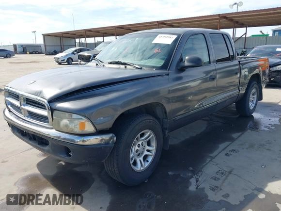 2001 Dodge Dakota z VIN 1B7HL2AX51S333575, wystawiony jako IAAI lot #41782582 z przebiegiem 291 640 mil mil oraz . Historia ofert i sprzedaży dostępna na DreamBid. Obrazek 2.