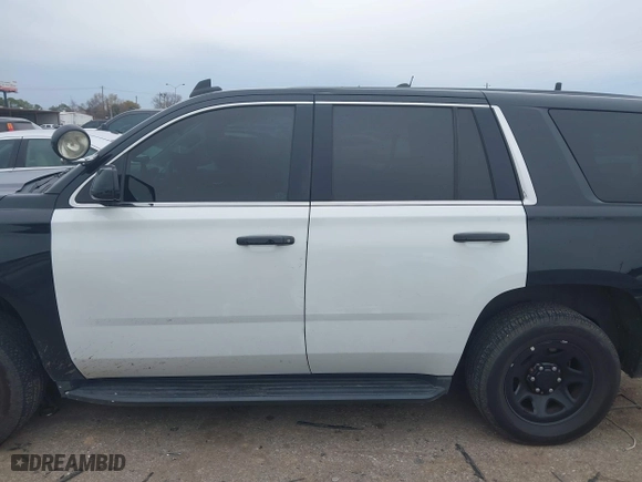 2018 Chevrolet Tahoe Commercial with VIN 1GNLCDEC1JR312458, listed as a IAAI auction lot 41371563 with 114,086 mi miles. Bid and sale history available at carsss.com. Image 14.