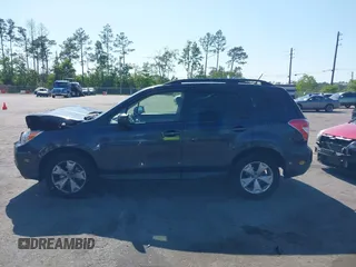 2015 Subaru Forester 2.5i with VIN JF2SJABC6FH823742, listed as a IAAI auction lot 42069857 with 74,966 mi miles. Bid and sale history available at carsss.com. Image 14.