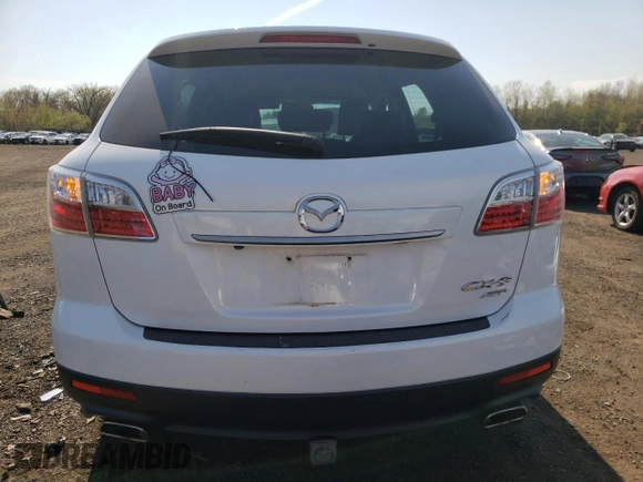 2010 Mazda CX-9 Grand Touring z VIN JM3TB3MV4A0215694, wystawiony jako Copart lot #54254805 z przebiegiem 168 263 mil mil oraz Szkoda całkowita • Salvage title. Historia ofert i sprzedaży dostępna na DreamBid. Obrazek 6.