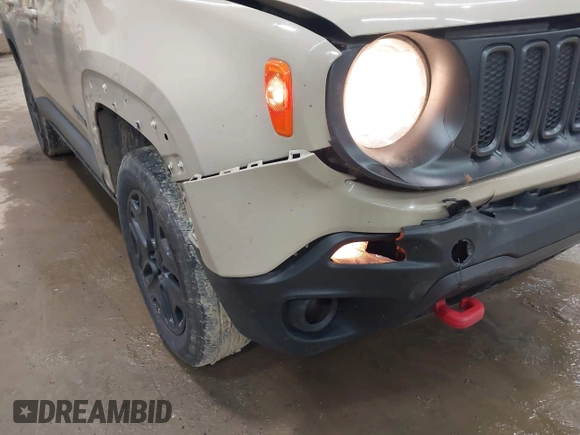 2017 Jeep Renegade Trailhawk z VIN ZACCJBCB6HPE97998, wystawiony jako IAAI lot #42435849 z przebiegiem 105 490 mil mil oraz . Historia ofert i sprzedaży dostępna na DreamBid. Obrazek 6.