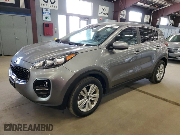 2018 Kia Sportage LX z VIN KNDPMCAC5J7426921, wystawiony jako Copart lot #57848805 z przebiegiem 128 089 mil mil oraz Czysty tytuł • Clean title. Historia ofert i sprzedaży dostępna na DreamBid. Obrazek 1.