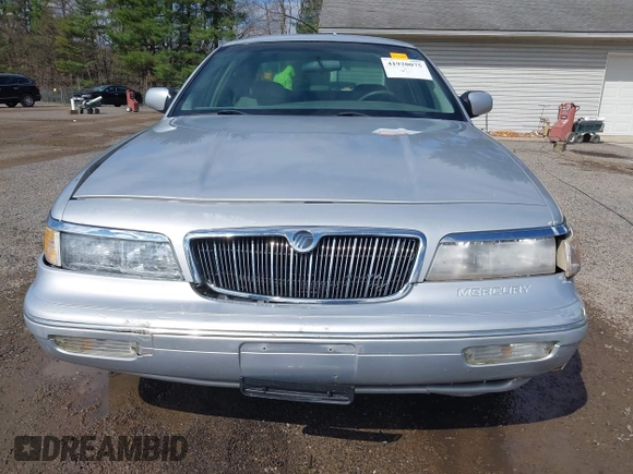 1997 Mercury Grand Marquis LS with VIN 2MELM75W3VX717801, listed as a IAAI auction lot 41920075 with 173,730 mi miles and . Bid and sale history available at DreamBid. Image 12.