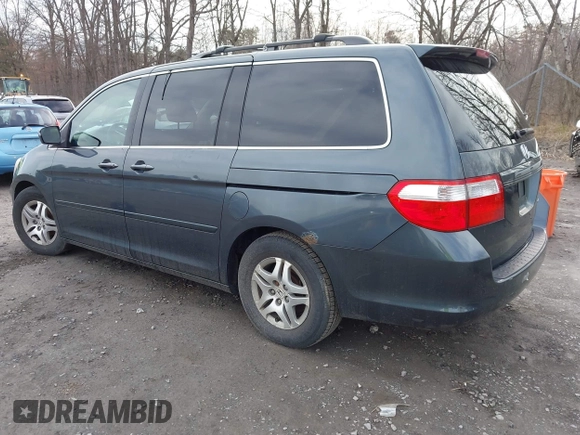 2005 Honda Odyssey EX-L with VIN 5FNRL38645B008281, listed as a IAAI auction lot 41985052 with 219,693 mi miles. Bid and sale history available at carsss.com. Image 3.