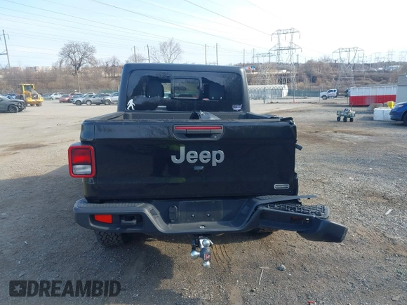 2021 Jeep Gladiator Overland z VIN 1C6HJTFG1ML606215, wystawiony jako IAAI lot #41771646 z przebiegiem 77 411 mil mil oraz . Historia ofert i sprzedaży dostępna na DreamBid. Obrazek 16.