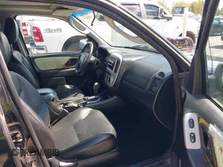 2006 Ford Escape Limited z VIN 1FMCU94106KA37275, wystawiony jako IAAI lot #42084150 z przebiegiem 139 361 mil mil oraz . Historia ofert i sprzedaży dostępna na DreamBid. Obrazek 5.