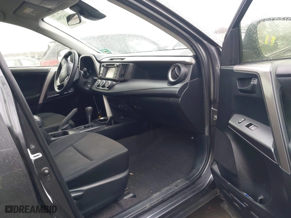 2018 Toyota RAV4 LE with VIN JTMBFREV0JJ223957, listed as a IAAI auction lot 41652810 with 144,629 mi miles. Bid and sale history available at carsss.com. Image 5.