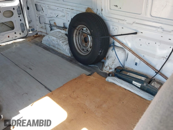 1999 Ford Econoline Cargo with VIN 1FTRE1421XHB21609, listed as a IAAI auction lot 42070347 with 103,104 mi miles. Bid and sale history available at carsss.com. Image 8.