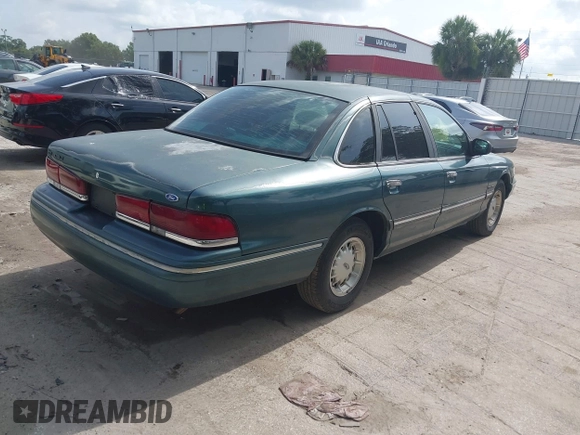 1995 Ford Crown Victoria LX с VIN 2FALP74W9SX120258, выставлен на аукционе IAAI как лот 42414057 с пробегом 210 215 миль миль и . История ставок и продаж доступна на DreamBid. Изображение 4.