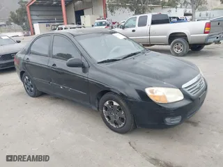 2008 Kia Spectra EX with VIN KNAFE122985511931, listed as a IAAI auction lot 42111053 with 251,276 mi miles. Bid and sale history available at carsss.com. Image 1.
