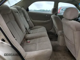 2001 Mazda 626 LX z VIN 1YVGF22C715202574, wystawiony jako Copart lot #54132915 z przebiegiem 237 041 mil mil oraz Szkody całkowita. Historia ofert i sprzedaży dostępna na DreamBid. Obrazek 10.