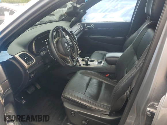 2014 Jeep Grand Cherokee Limited z VIN 1C4RJFBG7EC204799, wystawiony jako Copart lot #62458805 z przebiegiem 126 966 mil mil oraz Szkoda całkowita • Salvage title. Historia ofert i sprzedaży dostępna na DreamBid. Obrazek 7.