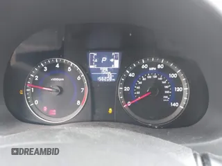 2016 Hyundai Accent SE with VIN KMHCT5AE6GU290609, listed as a IAAI auction lot 42006125 with 156,208 mi miles. Bid and sale history available at carsss.com. Image 7.